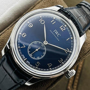 PORTUGUESE HAND-WOUND STEEL CASE BLACK DIAL