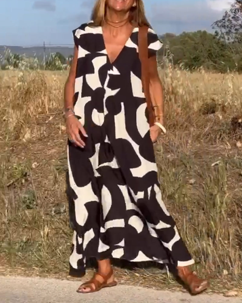 SITA - Dress with print and V-neckline