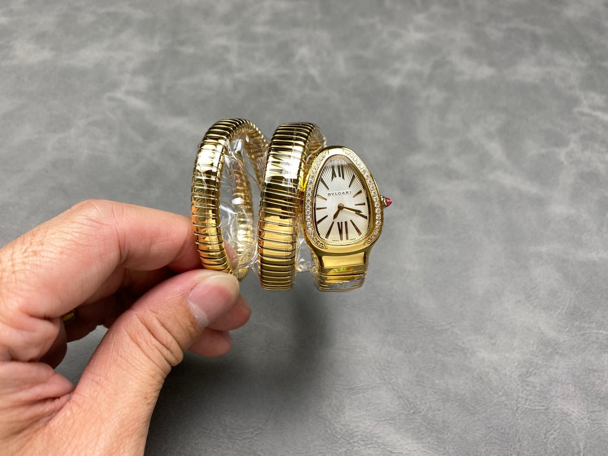 Bulgari Serpenti 35mm Tubogas 18k Yellow Gold Diamonds Silver Dial