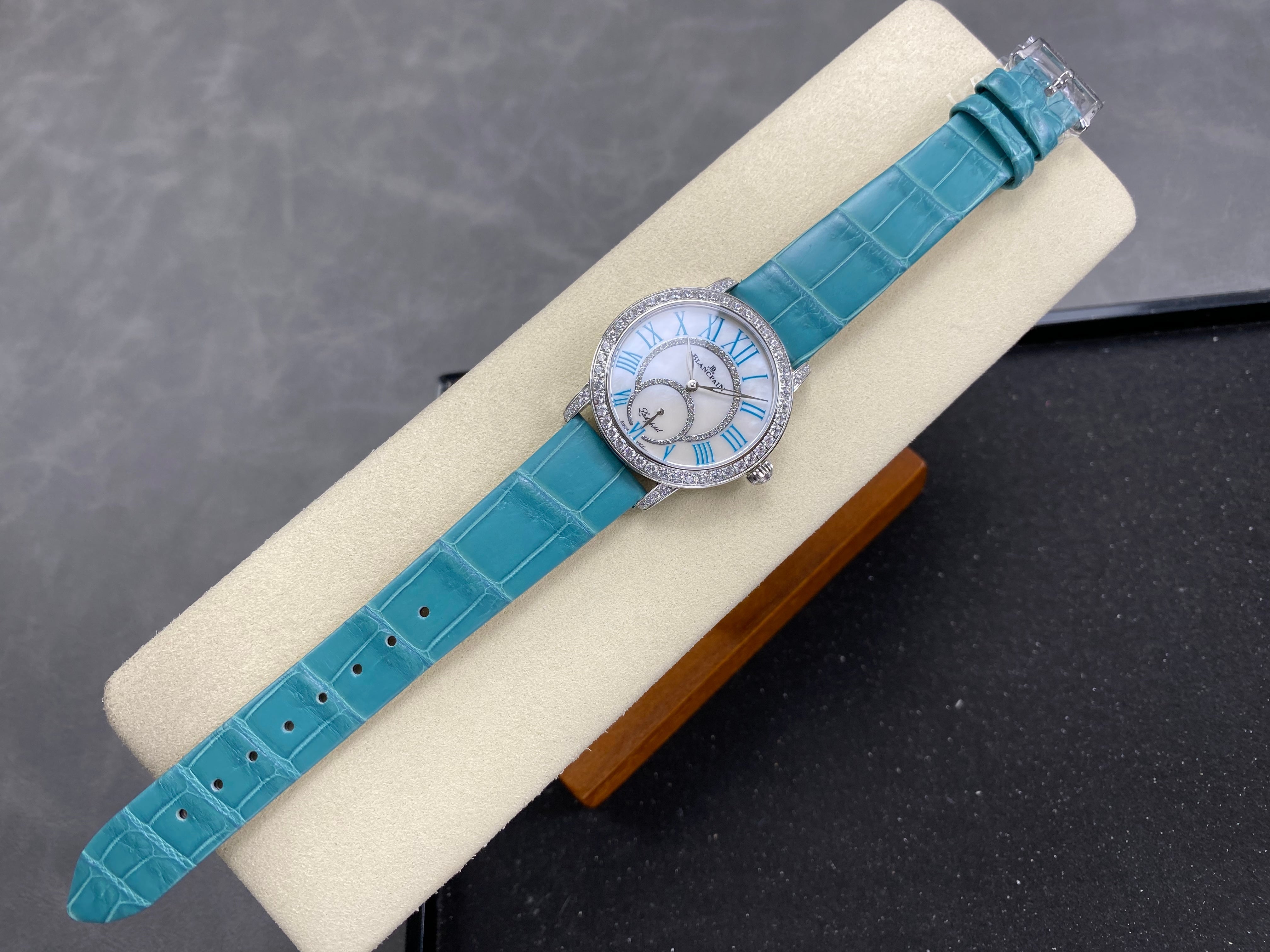 Blancpain's Ladybird 35mm White Blue Dial Diamond Bezel Crocodile Leather