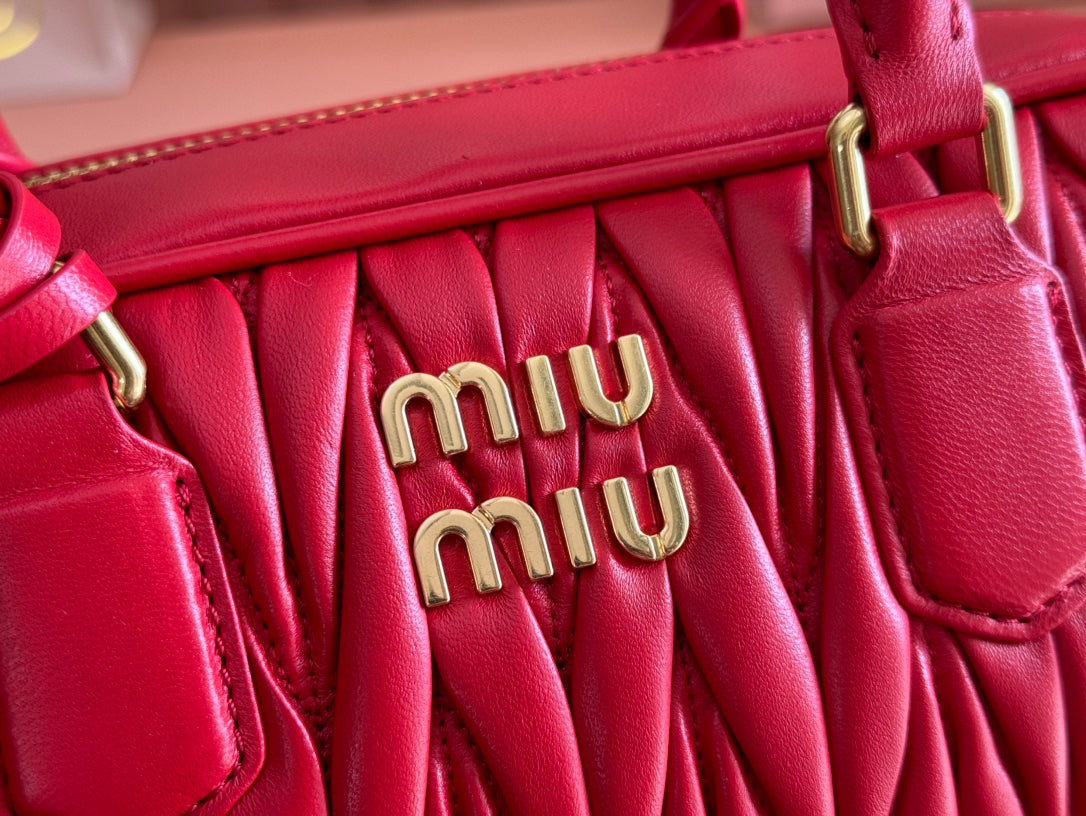 ARCADIE MATELASSÃ‰ BAG 24 IN CERISE RED CALFSKIN GOLD HARDWARE